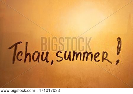 Handwritten Lettering Tchau In Portuguese Language Is Bye In English And Summer On Misted Glass On S