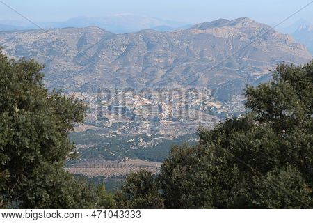 Maigmo Mountain Range, Tibi, Alicante, Spain, February 17, 2023: Views Between The Trees From The Pe