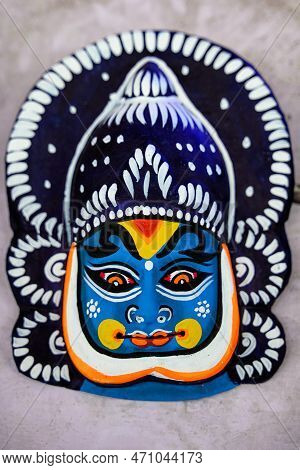 Beautiful Handmade Chhau Mask For Kathakali Dance Displayed In A Shop For Sale In Blurred Background