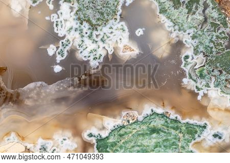 Agate Mineral Stone With A Milky Surface And Green Inclusions Which Look Like Moss
