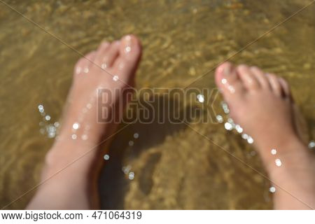 Feet Resting In The Waters Of The Waterfall In Goiás