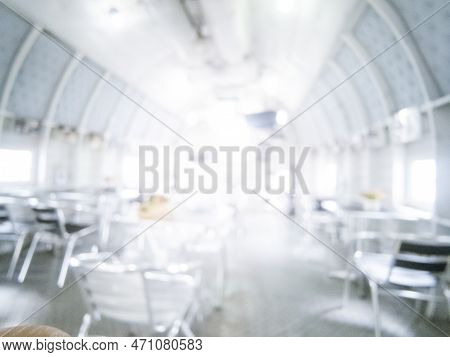 White Blurred Background Bright Restaurant Shopping Mall Silver Gray Lighting. Defocused Store Light