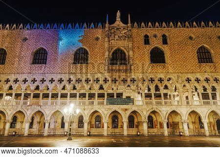 Venice Italy Night View Of Illuminated Palazzo Ducale, Doges Palace Facade Built In Venetian Gothic