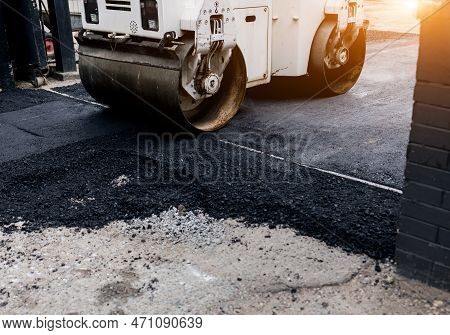 Laying Of New Asphalt. Asphalt Paving Machine