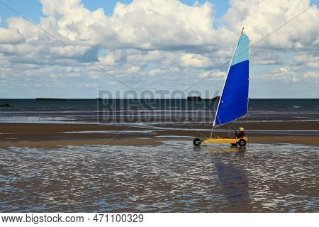 Arromanches, France - October 14 2012: Land Sailing On Gold Beach In Normandy. In The Background, We