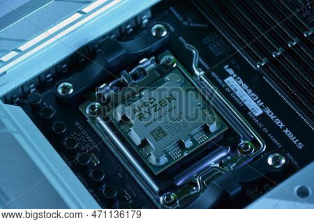 Close-up Of An Amd Ryzen 9 7900X Processor Installed On A Motherboard Asus Rog Strix X670E