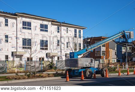 New Low-rise Apartments Building Construction. Housing Construction In Surrey Canada. Residential Bu
