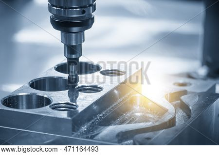 The Hole Chamfer Process On Cnc Milling Machine With Lighting Effect. The Metal Working Concept On T