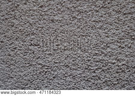 Coarse Surface Of Dusty Wall With Coarse Light Gray Roughcast Finish