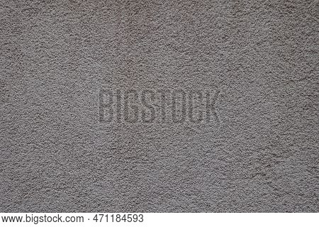 Surface Of Dusty Wall With Coarse Light Gray Roughcast Finish