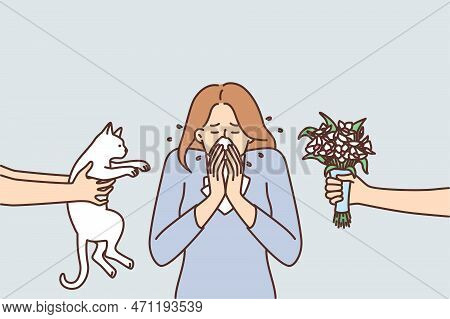 Woman Sneezes Or Experiences Rheum Covering Nose With Tissue Due To Allergic Reaction To Cat Or Flow