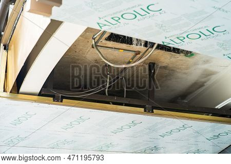 Kuala Lumpur, Malaysia - January 22, 2021: Ceiling With Wires And Pipes In The Construction Site.