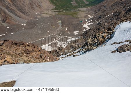 Awesome Alpine View From Above To Large High Mountain Valley. Vertigo View From Top To Snow Couloir 