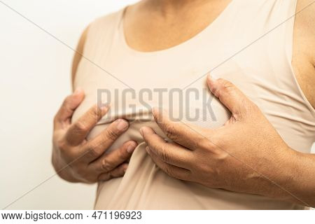 Asian Woman Patient Checking And Worry Her Breast, Breast Self Exam Or Bes, Symbol Of World Breast C