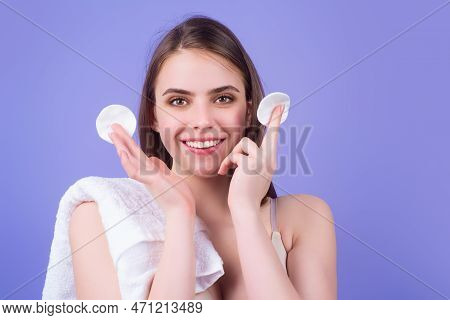 Woman Cleaning Face With A Cotton Pad. Skincare, Cotton Pad And Woman Cleaning Face On Studio Backgr