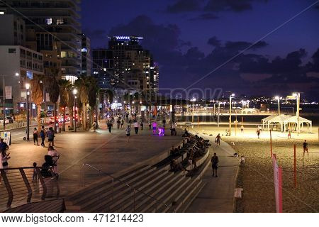 Tel Aviv, Israel - November 2, 2022: People Visit Beachfront Promenade (tayelet) In Tel Aviv, Israel
