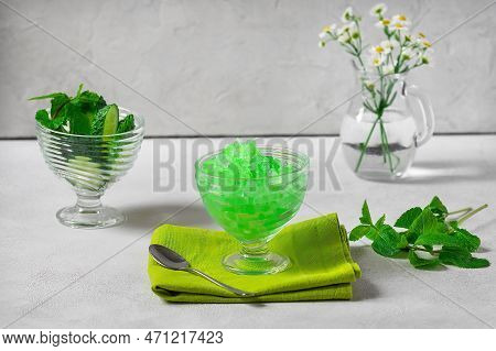 Summer Sicilian Dessert Granita, Frozen Juice Of Fresh Cucumber And Mint On A White Background. Summ