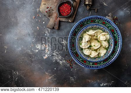 Dumplings In The Soup Chuchvara Banner, Menu, Recipe Place For Text, Top View. Uzbek Cuisine.