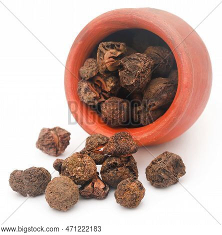 Dried Amla Fruits In Bowl Over White Background