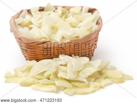 Sliced Amla Fruits In A Bowl Over White Background