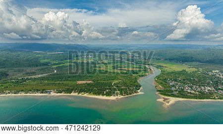 The River Flows Into The Sea And The Beach. Tropical Landscape. Sipalay, Negros, Philippines.