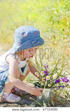 Cute Girl With Wildflowers