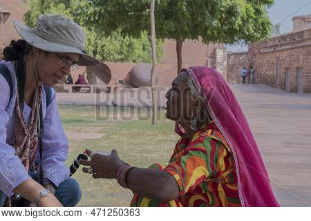 Jodhpur, Rajasthan, India - 19th October 2019 : Young Indian Female Tourist In Modern Dress Speaking