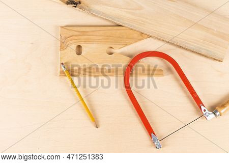 Carpentry Profession Ideas. Variety Of Separate Lineup Of Assorted Work Tools On Wood