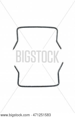 Building Ideas. Closeup Of Two Separate Metal Connecting Braces Nails Placed Bulk Over White.