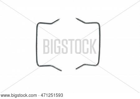 Building Ideas. Closeup Of Two Separate Metal Connecting Braces Nails Placed Bulk Over White.