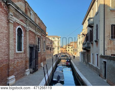 Venice, Italy - February 13, 2023: Street With Narrow Canal And Apartment Buildings In Sestiere Of C