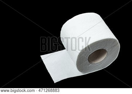 Roll Of Toilet Paper Is Insulated On Black Background. Soft White Toilet Paper Or Tissues. Hygiene P