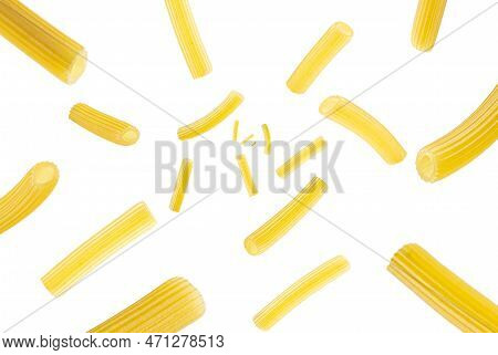 Collection Of Italian Pasta Sedani Rigati Falling Isolated On White Background. Selective Focus
