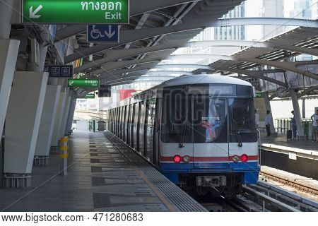 Bangkok, Thailand- 12 Feb, 2023: Bts Sky Train Approaches The Station Platform In Bangkok. Bts Skytr