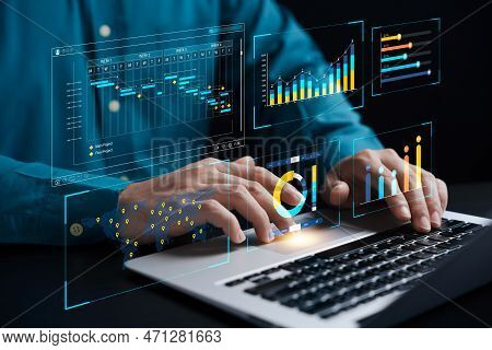 Businessman Analyzing Business Enterprise Data Management, Business Analytics With Charts, Metrics A