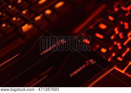 G.skill Ddr5 Trident Z5 Rgb Desktop Memory Pack On Backlit Keyboard Background.