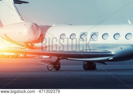 Scenic Side Close View Modern Luxury Expensive Private Jet Plane Parked Airport Taxiway Hangar Warm 