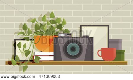 Wall Shelf With Home Plant In Pot, Camera, Cup, Books And Box, Houseplant, Pictures And Other Decor.
