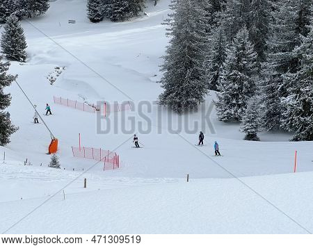 Snowboard And Ski Trails Or Alpine Trails For Winter Sports Above The Tourist Resorts Of Valbella An