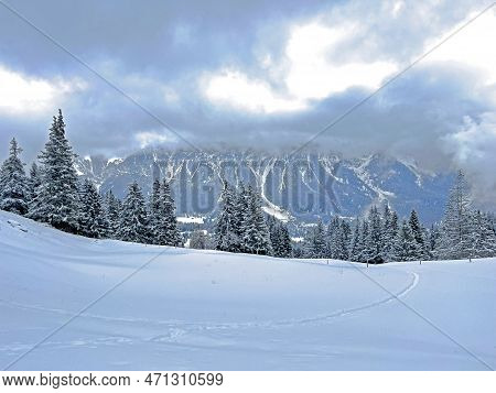 Beautiful Low Winter Clouds And Fog Condensation In The Swiss Alps Above The Tourist Resorts Of Valb