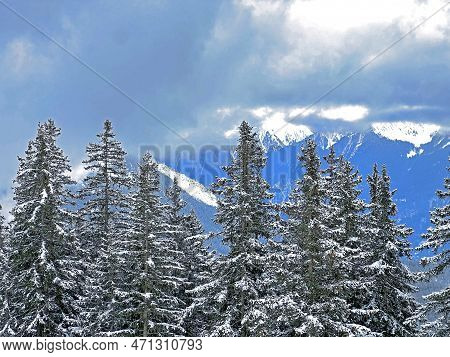 Beautiful Low Winter Clouds And Fog Condensation In The Swiss Alps Above The Tourist Resorts Of Valb
