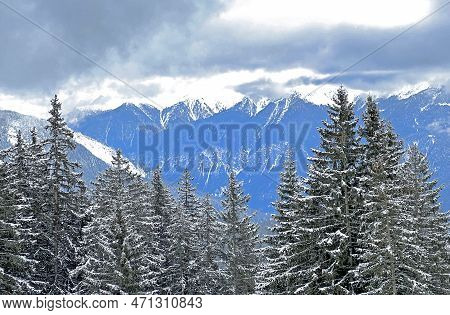 Beautiful Low Winter Clouds And Fog Condensation In The Swiss Alps Above The Tourist Resorts Of Valb