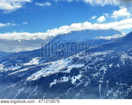 Beautiful Low Winter Clouds And Fog Condensation In The Swiss Alps Above The Tourist Resorts Of Valb