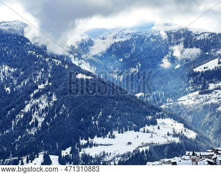Beautiful Low Winter Clouds And Fog Condensation In The Swiss Alps Above The Tourist Resorts Of Valb