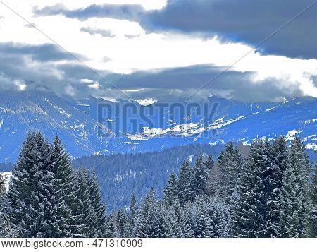 Beautiful Low Winter Clouds And Fog Condensation In The Swiss Alps Above The Tourist Resorts Of Valb