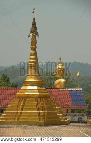 Kanchanaburi , Thailand - April 17 , 2016 : Golden Pagoda And Outdoor Large Buddha At Wat Somdet, A 