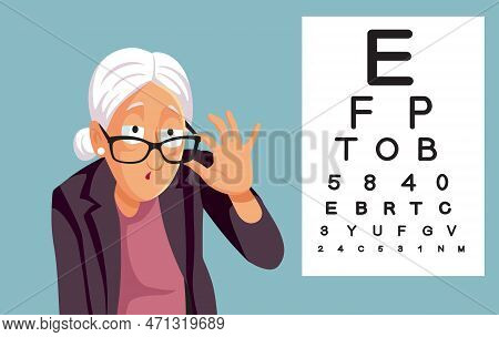 Elderly Patient Suffering From Eye Problem Checking A Snellen Chart