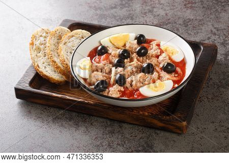 Fresh And Delicious Murcian Moje Traditional Salad With Canned Tomatoes, Tuna, Eggs And Onions Toppe