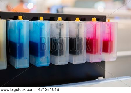 Row Of Inkjet Printer Cmyk Cartridges - Cyan, Magenta, Yellow, Key Or Black Colors - Close Up View.