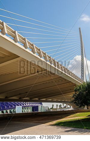 View From Below Of The Pont L'assut De L'or Bridge Near The City Of Arts And Sciences Modern Buildin
